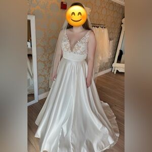 Wedding Gown with Satin Skirt and Lace Embellishments